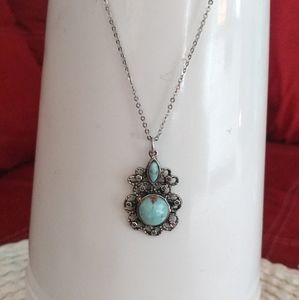 Silver necklace with turquoise pendant